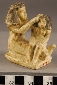 Thumbnail of Plaster Cast of Figural Group of a Seated Female Figure Dressing a Girl