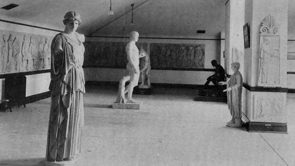 historical photo of a gallery with statues