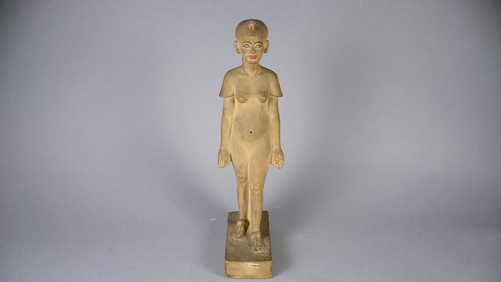 mostly unpainted figure of a standing nude woman