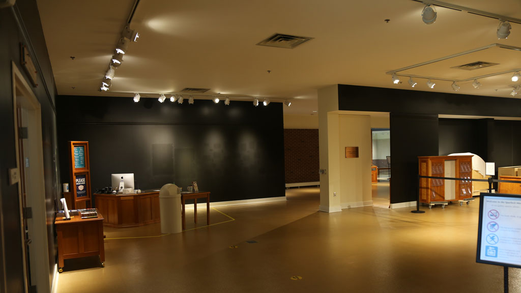 view of the Spurlock Museum lobby with the information desk in the corner