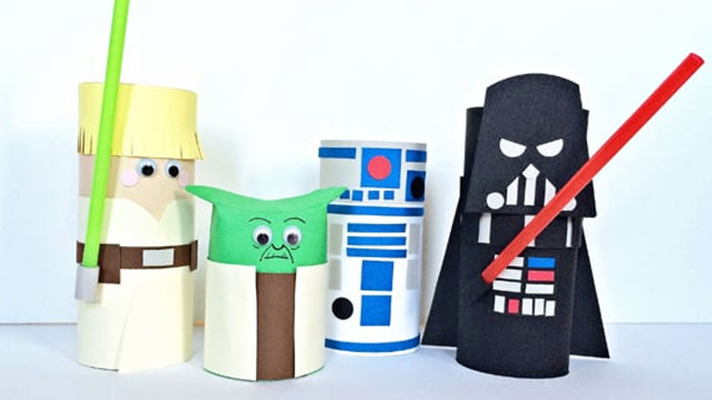4 toilet paper rolls that have been made to look like Star Wars characters