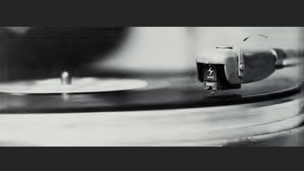 Black and white photo of a record player.