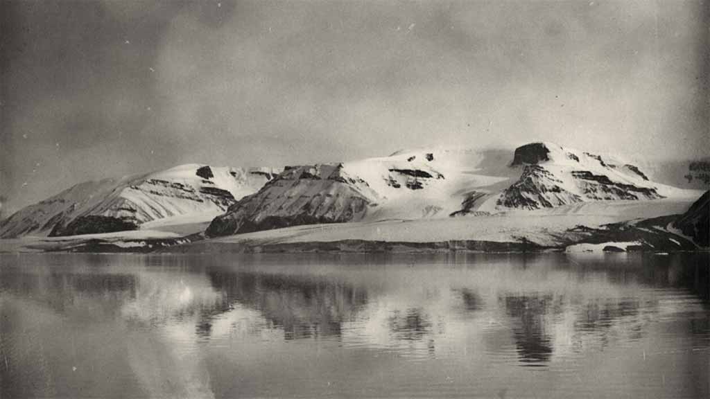 arctic landscape: mountain with reflection in water