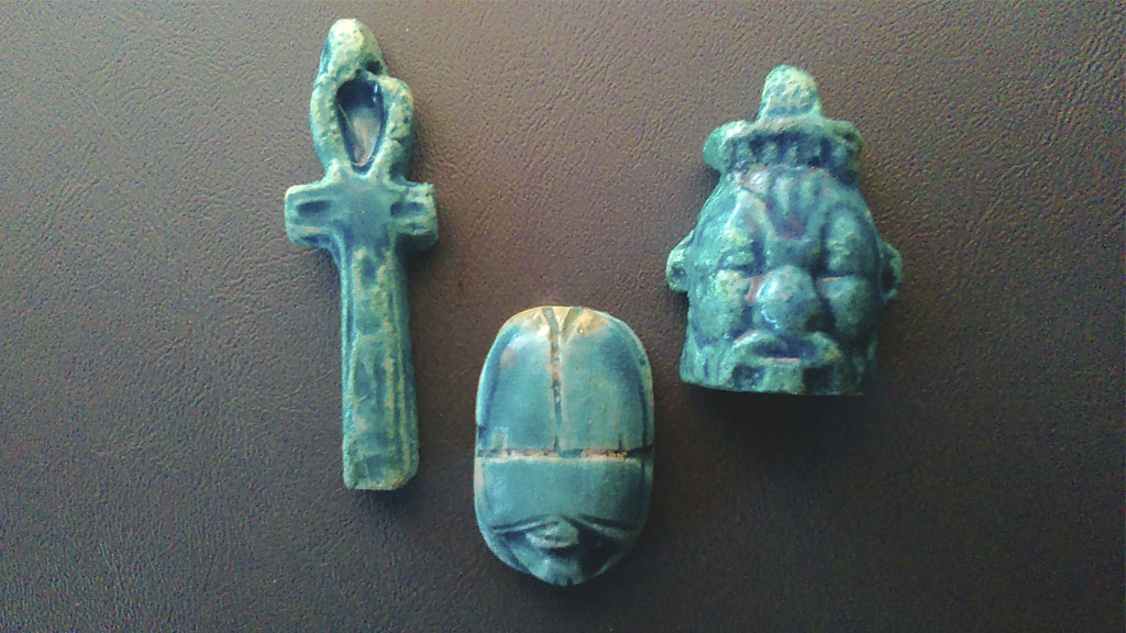 three amulets from the kit