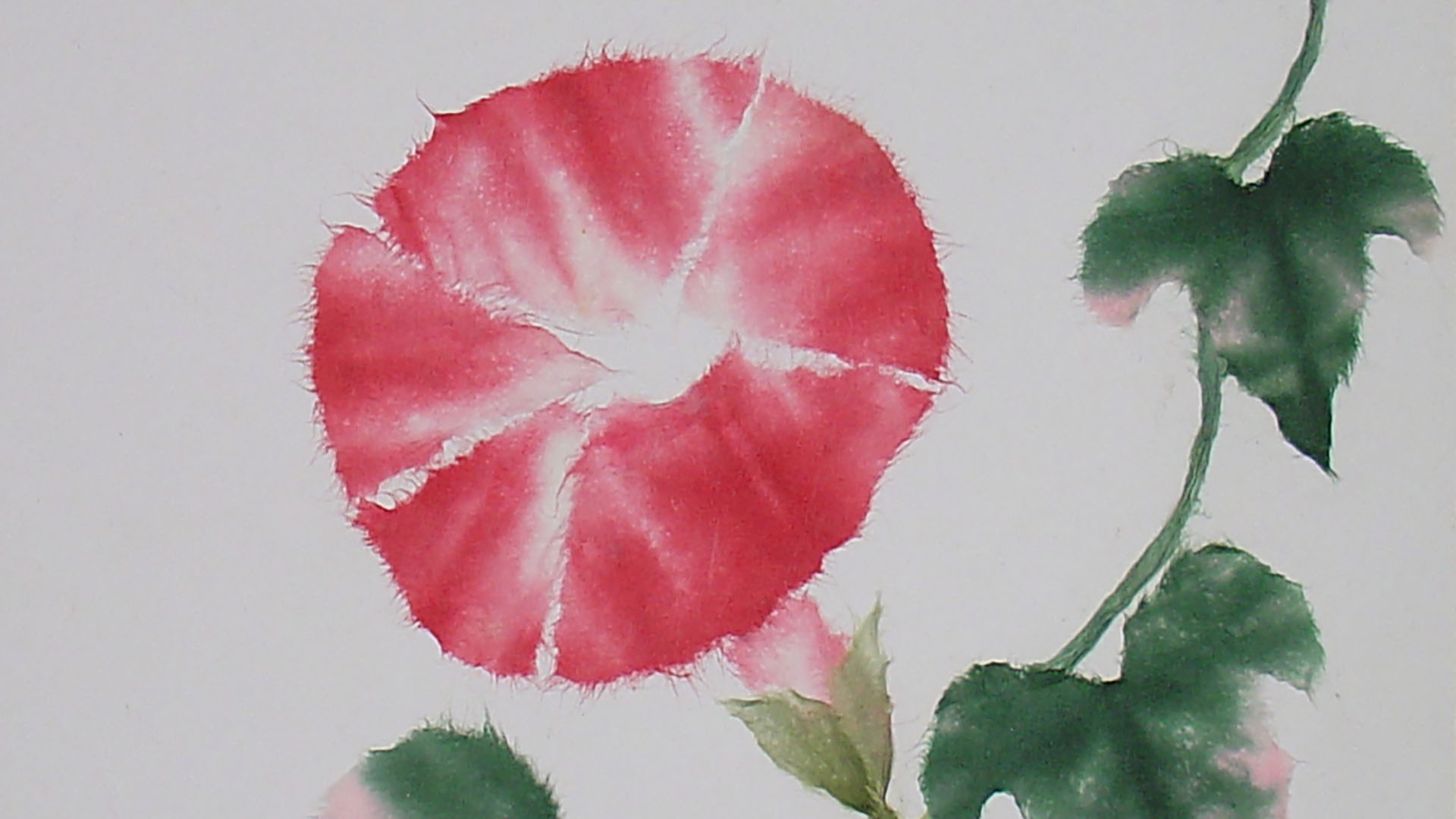 chigiri art piece of a large red flower and a green vine on white paper
