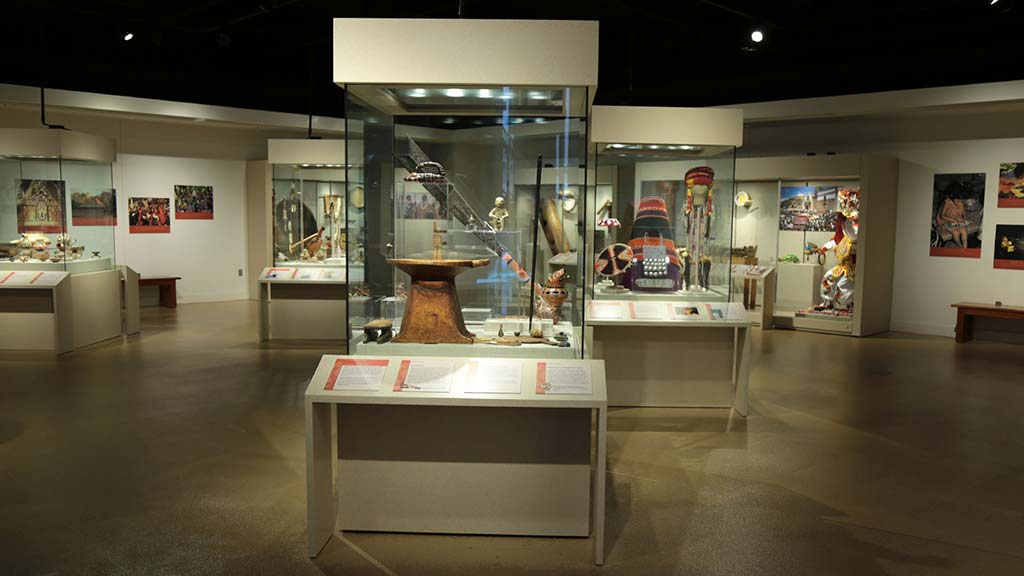 Glass cases holding artifacts in South America exhibit
