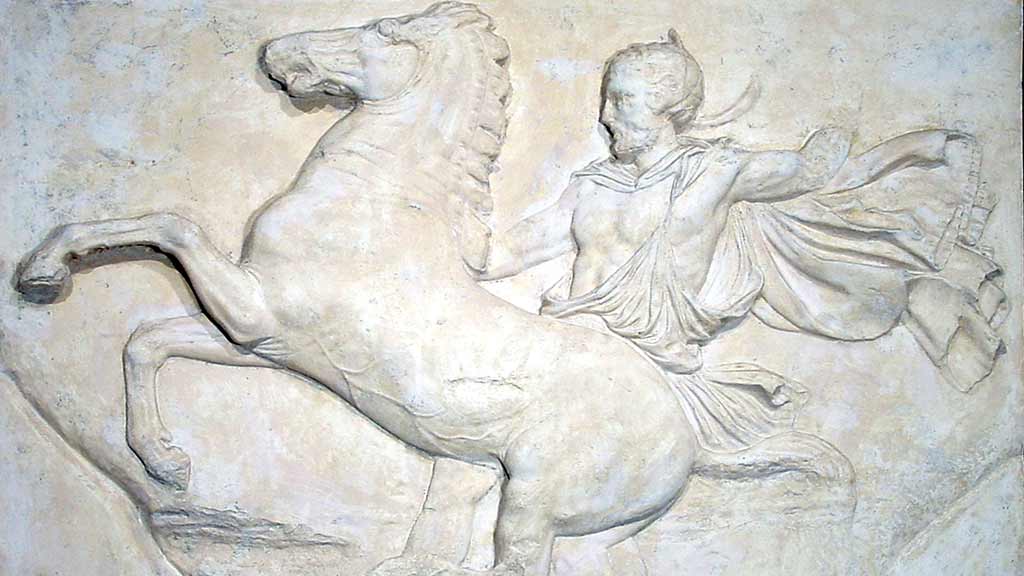 carved wall panel depicting a man riding a horse