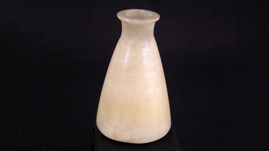alabaster vessel with narrow opening and wider base