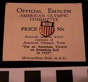 Thumbnail of Commemorative Olympic Pin: Official Emblem of the American Olympic Commitee, Mounted on white paper stock (1977.01.1011L)