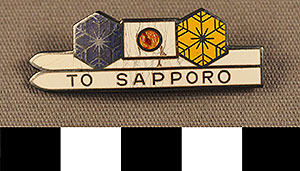 Thumbnail of Commemorative Olympic Pin: "To Sapporo," Skis, Flag of Japan (1977.01.1125)