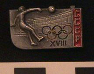 Thumbnail of Commemorative Pin for XVIII Summer Olympic Games in Tokyo worn by the Coaches, Trainers and Judges on the Soviet Olympic Team: Volleyball (1977.01.1340L)