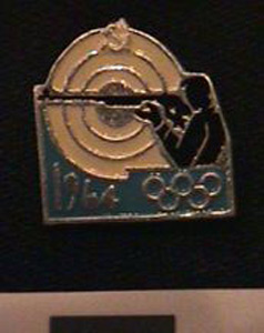Thumbnail of Commemorative Pin for XVIII Summer Olympic Games in Tokyo worn by the Coaches, Trainers and Judges on the Soviet Olympic Team: Shooting (1977.01.1340O)