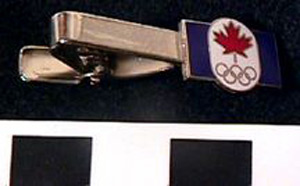 Thumbnail of Commemorative Olympic Tie Clip:  Maple Leaf, 5 Rings (1980.09.0039)