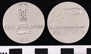 Thumbnail of Commemorative Silver Medal for XI Olympic Winter Games in Sapporo (1977.01.0390B)