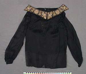 Thumbnail of Blouse with Belt Reused as a Collar ()