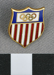 Thumbnail of Commemorative Olympic Pin: Official Emblem, Mounted on white paper stock (1977.01.1009X)
