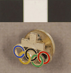 Thumbnail of Commemorative Olympic Pin: Cross, 5 Rings (1977.01.1148)