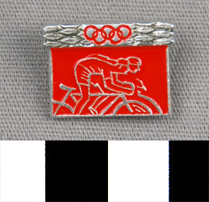 Thumbnail of Commemorative Pin for XVIII Summer Olympic Games in Tokyo worn by the Coaches, Trainers and Judges on the Soviet Olympic Team: Cycling (1977.01.1340S)