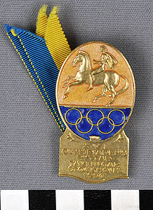 Thumbnail of Membership Badge: Organizing Committee for XVI Summer Equestrian Olympics (1977.01.1447)