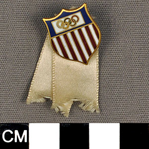 Thumbnail of Commemorative Olympic Pin: American Flag, 5 Rings (1977.01.1012)