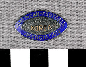 Thumbnail of Tie Tack: "American-Football Association, Korea" (1977.01.1249)