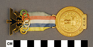 Thumbnail of International Olympic Committee Badge: IV Jugeos Deportivos Bolivarianos Barranquilla 1961 (1977.01.1358)