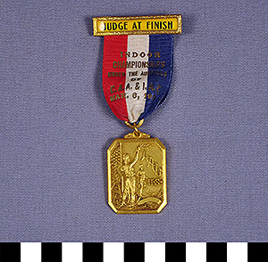 Thumbnail of Judge At Finish Badge: Amateur Athletic Union Championships (1977.01.1486)