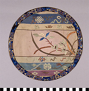 Thumbnail of Medallion, Clothing Fragment (1975.02.0002)