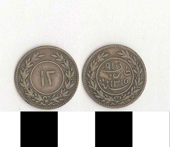 Thumbnail of Coin: Yemen, Tarim billon 12 (1971.15.2504)