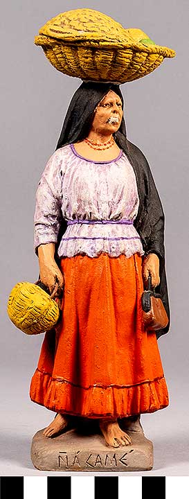 Thumbnail of Clay Figurine: Woman with Baskets on Her Head, by Serafin Marsal  (2020.04.0001)