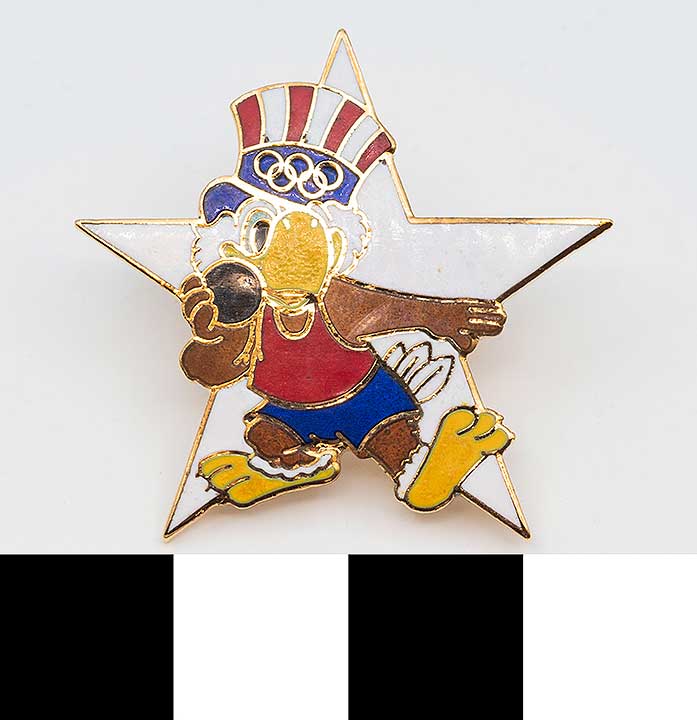 Thumbnail of Commemorative Olympic Pin Set: Eagle Doing Shot Put, White Star (1984.04.0001L)