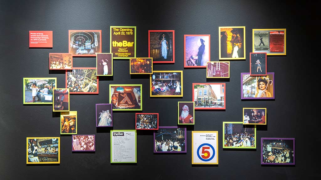 a wall of community-provided photographs in colorful frames
