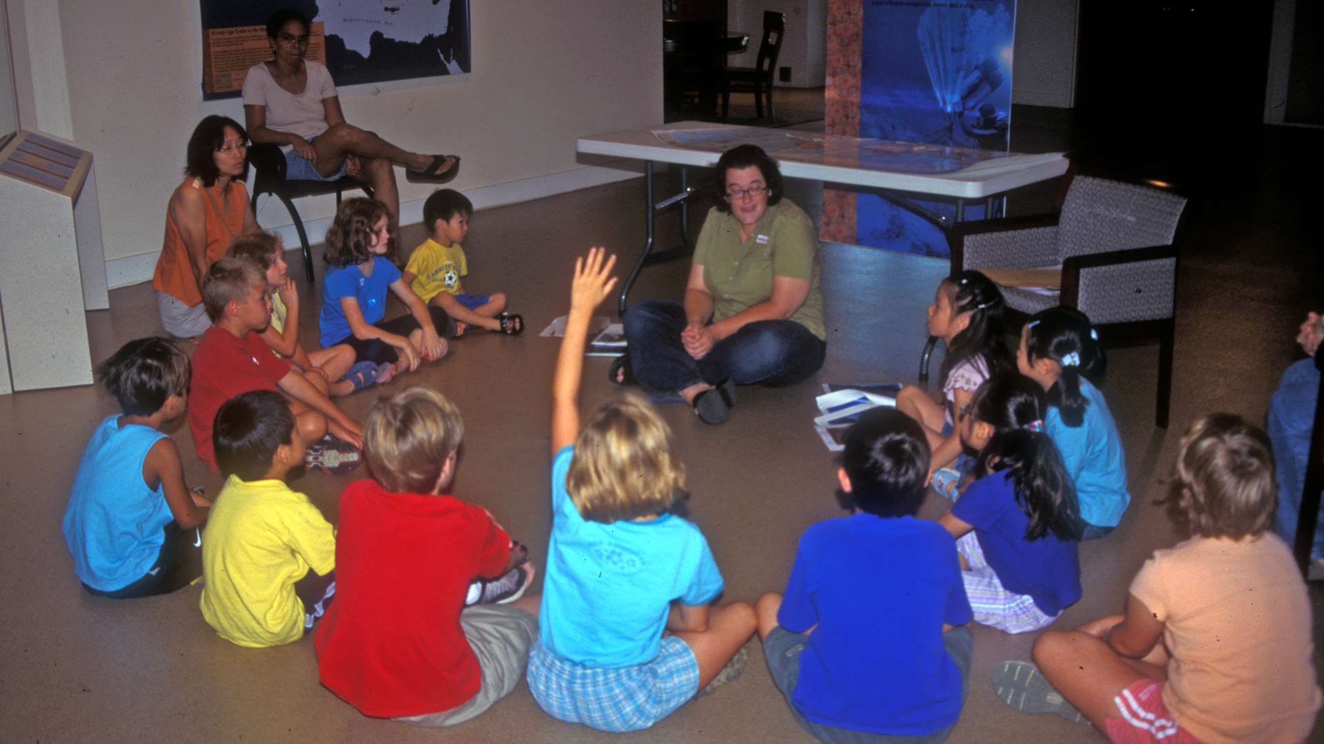 Children answer questions during the Museum's 'Archaeology Day'.