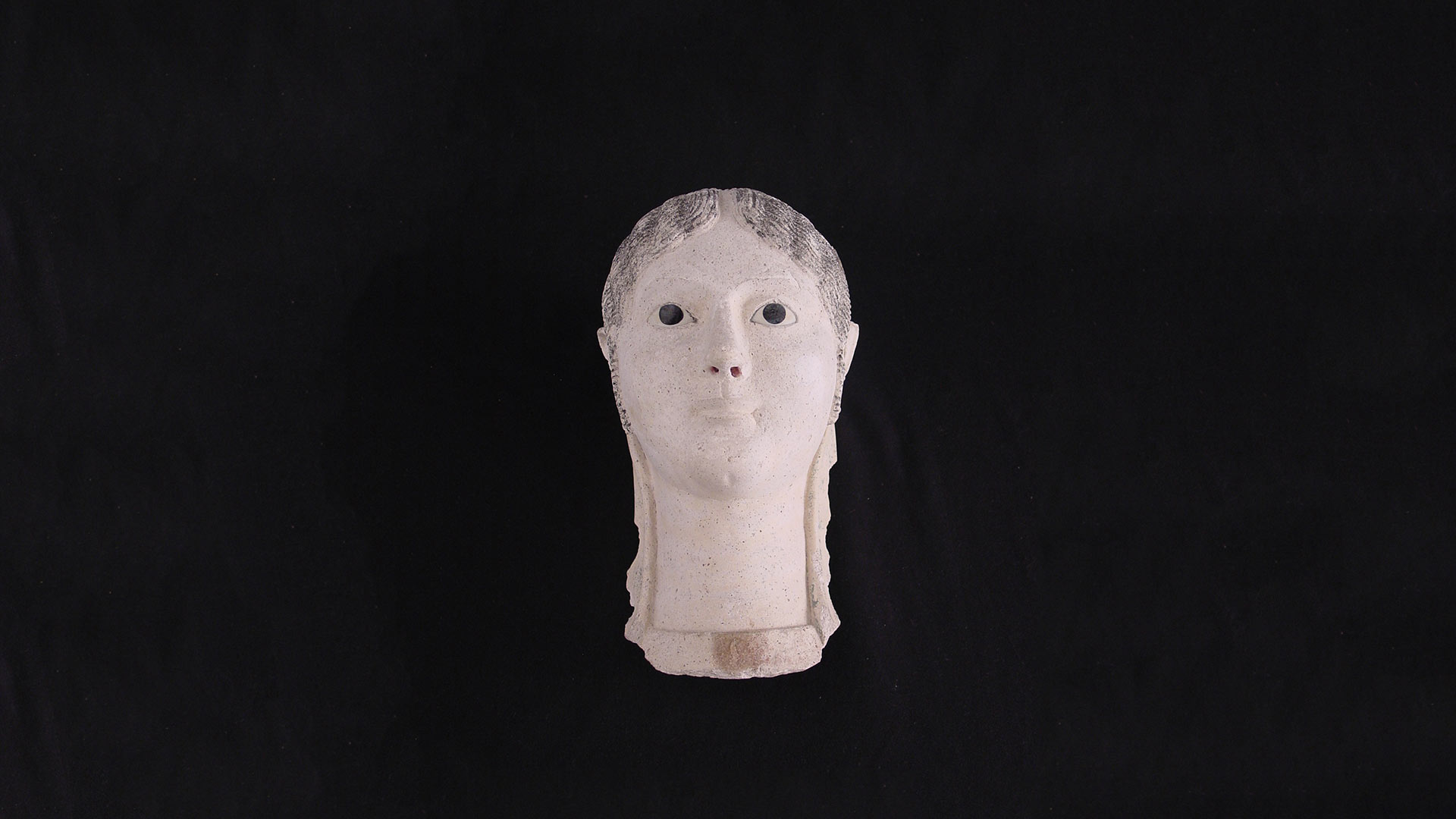 plaster burial mask of a woman