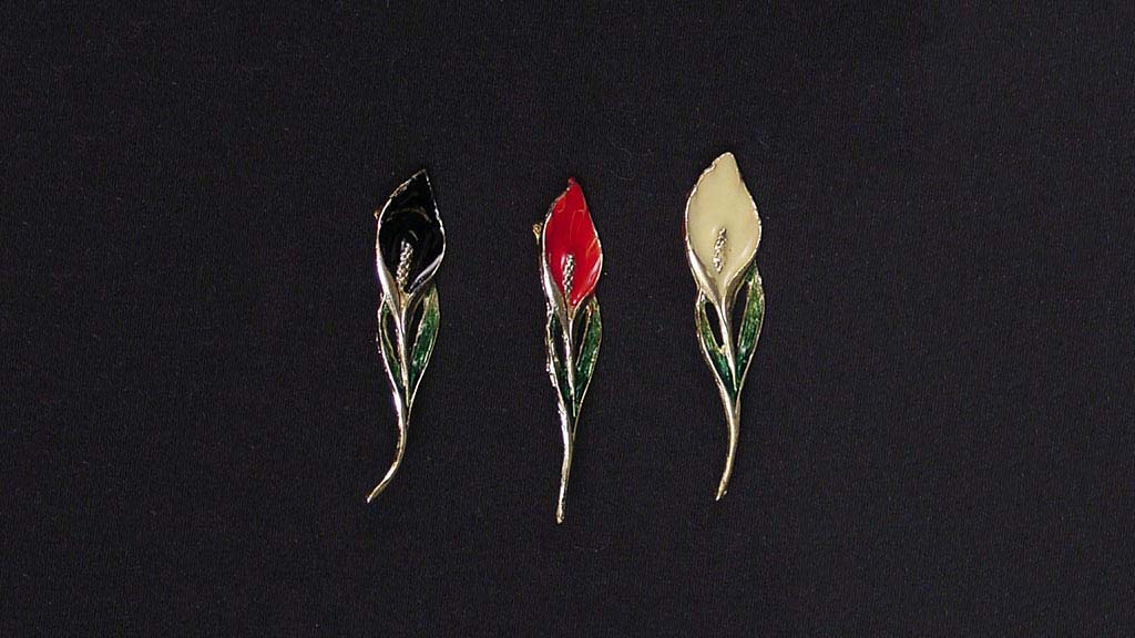 three flower brooches