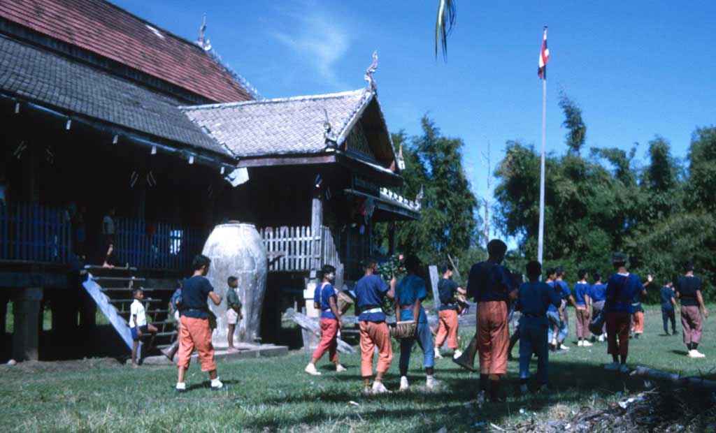 A group of boys by the temple 