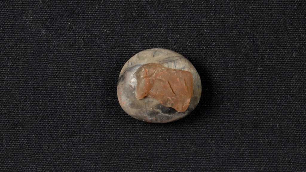 small tan stone like object