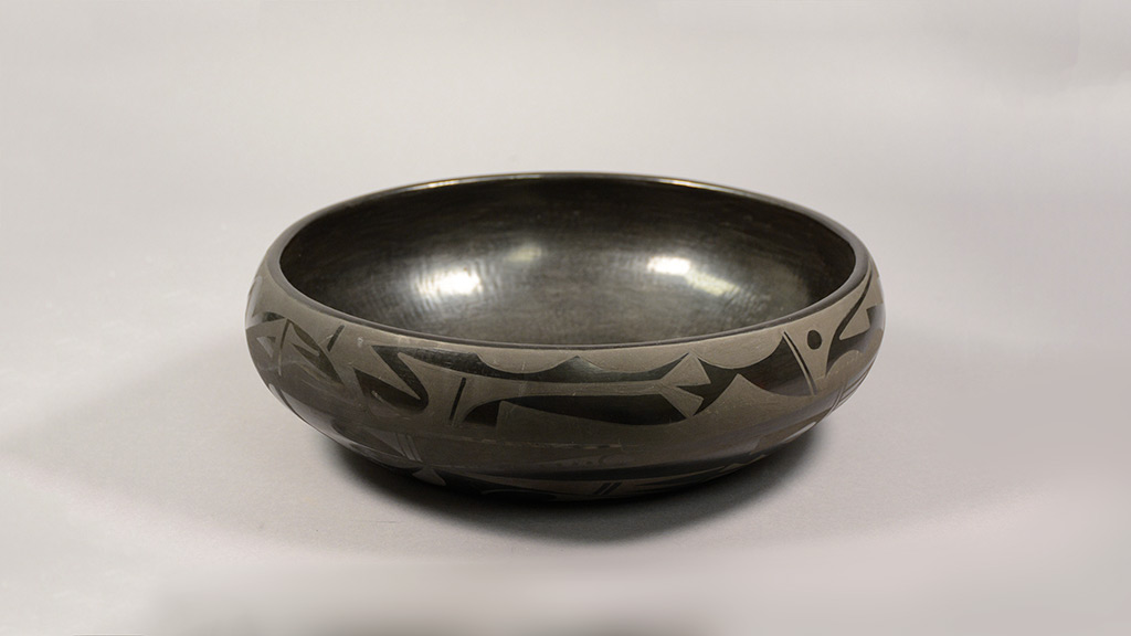 A polished, painted clay bowl