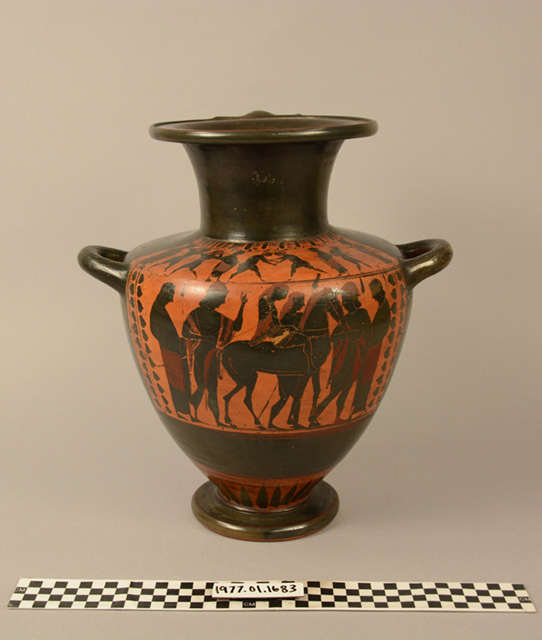 Black and copper vase from Europe photographed in paper background