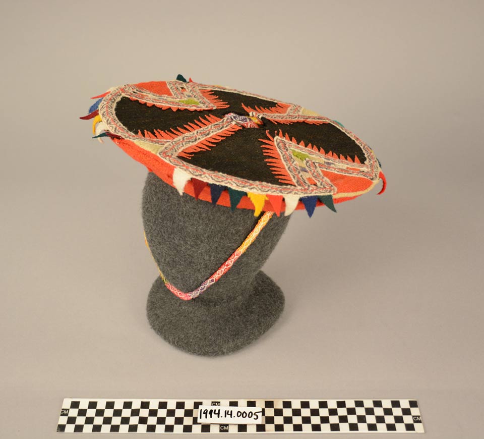traditional colorful hat photographed on a plastic head