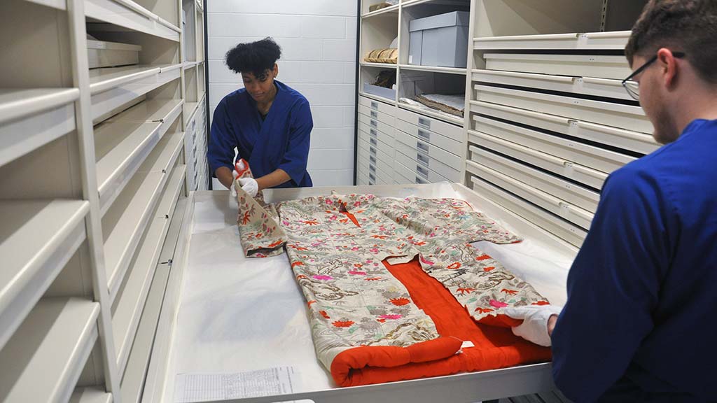 Collections staff perfects pan drawer storage