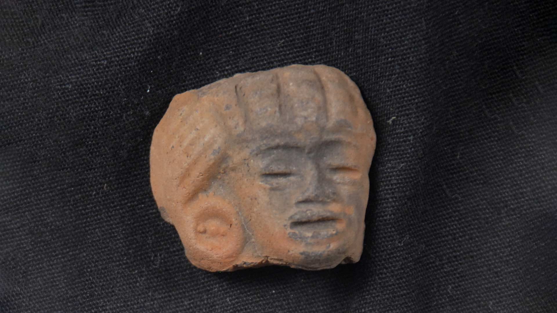 a ceramic fragment of a face 