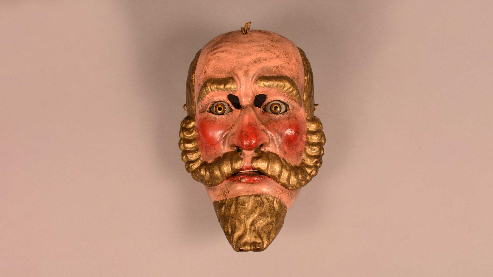 a mask of a man's face