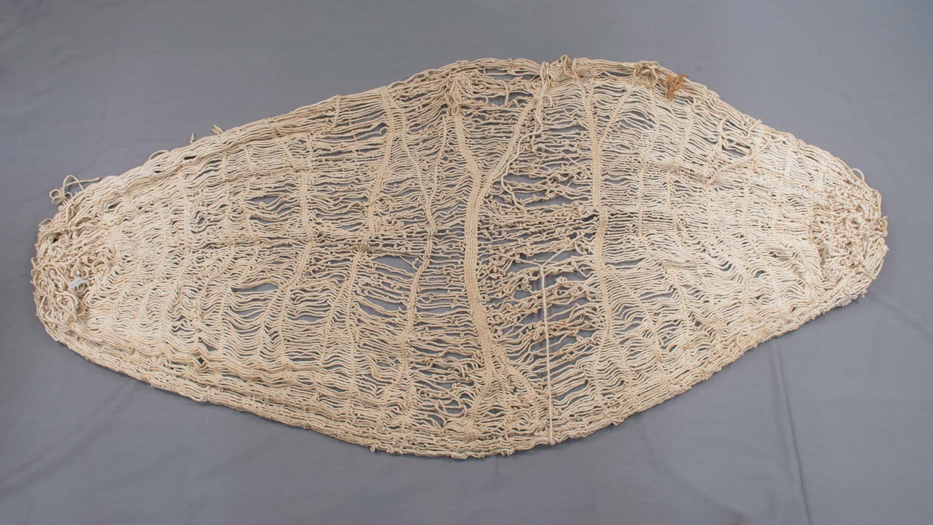large white hammock woven out of white fibers