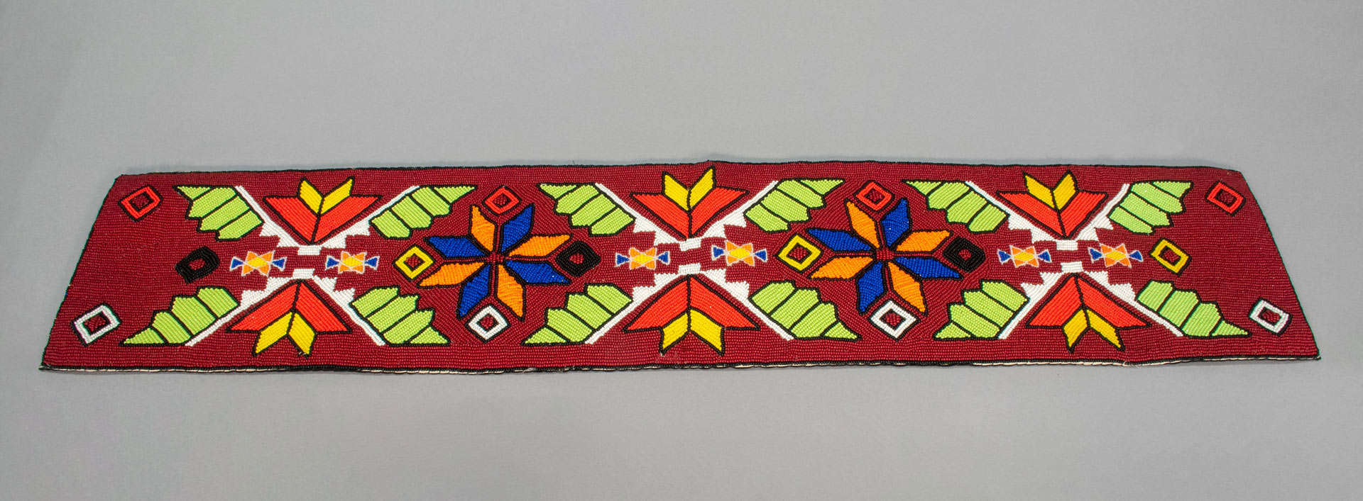 long red piece of fabric with colorful pattern