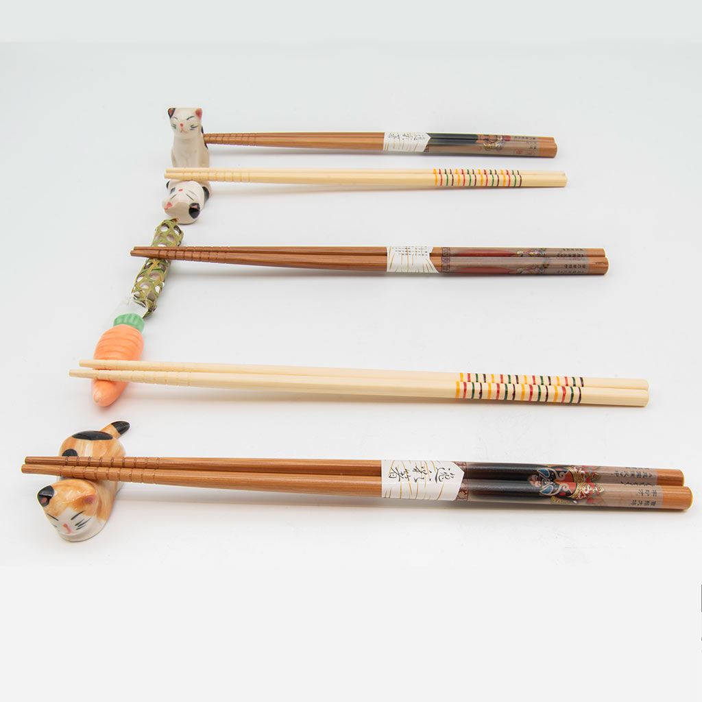 pairs of chopsticks on colorful rests