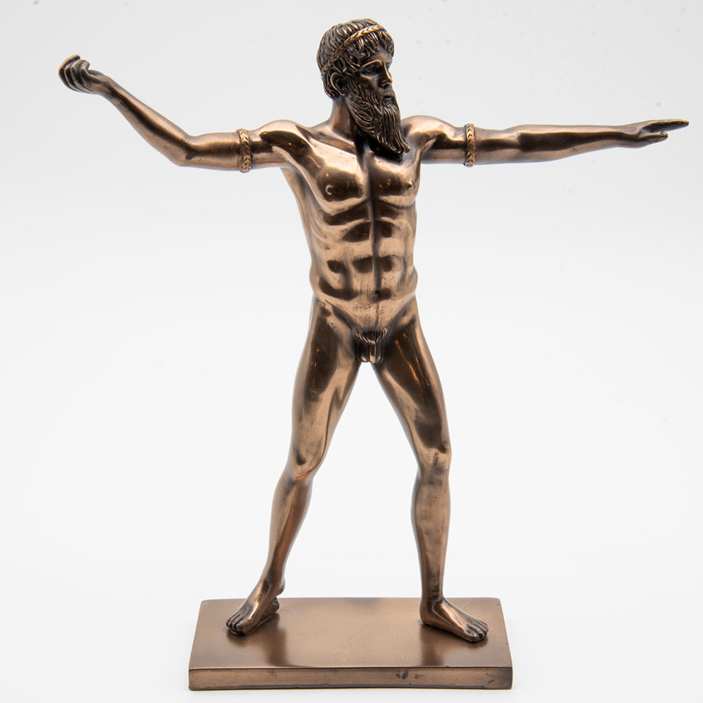 A bronze statue of a nude man in a throwing stance