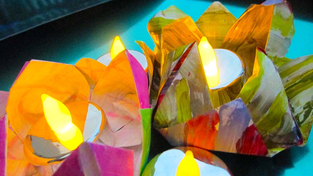 paper lotus flowers with tea light candles