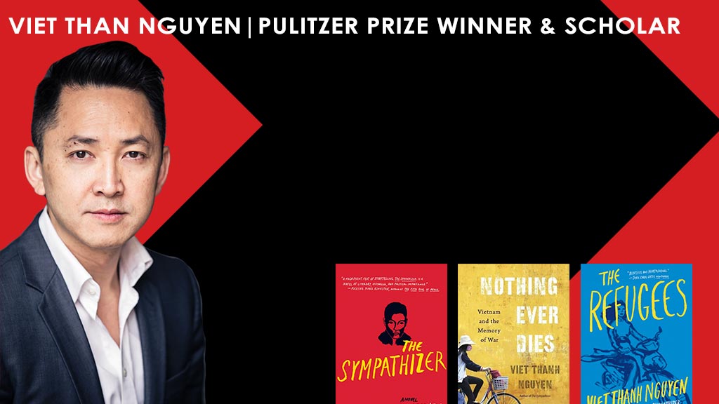 Vietnamese man in suit next to three books he wrote.