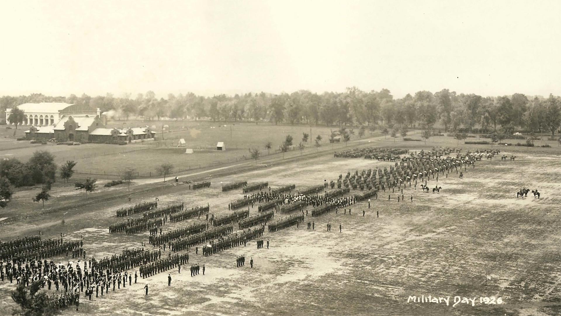 Military Day 1926: old photo of military drill with hundreds of soldiersl on a wide field